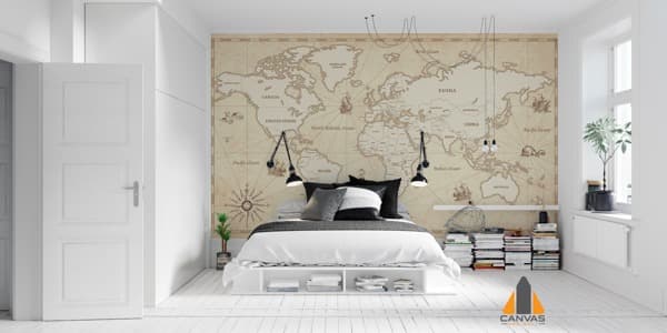 Vintage world map wall mural in a bright bedroom, ideal for wallpaper installations in Gauteng.