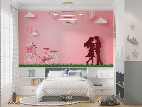 Pink paper-cut style romantic scene wall mural with couple and bicycle in a child's bedroom.