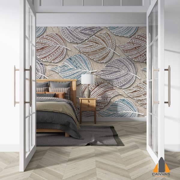 Bedroom with a textured leaf pattern wall mural, as seen through open French doors.
