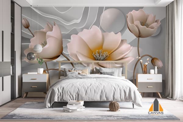 Large 3D light pink flowers on a grey wall mural in a modern bedroom with a large bed.