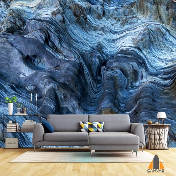 Craggy blue rock wall mural in a modern living room setting, ideal for wallpaper installations Johannesburg.