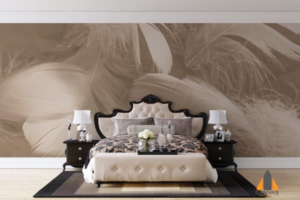 Brown and white feather wall mural behind a luxurious bed in an elegant bedroom.