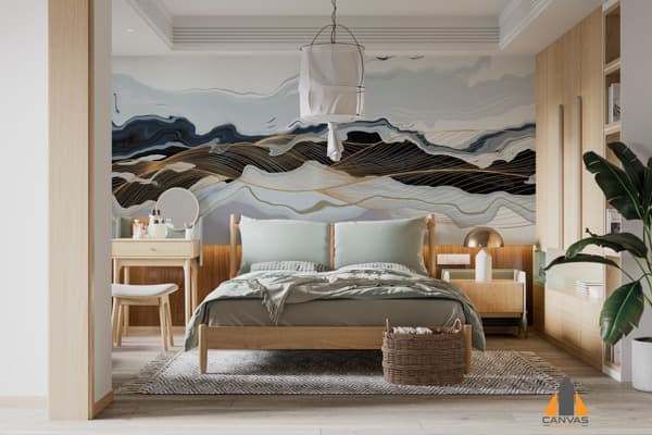 Abstract mountain landscape wall mural in a bedroom with natural wood furnishings and bedding.