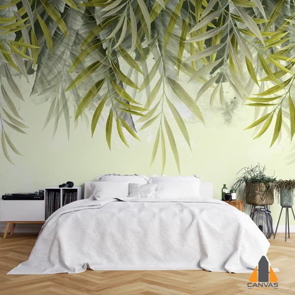Bedroom with a tropical leaf wall mural above the bed, showcasing wallpaper installations in Gauteng.