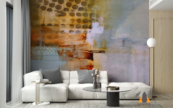 Abstract custom wallpaper installation in a modern living room with a white sectional sofa.