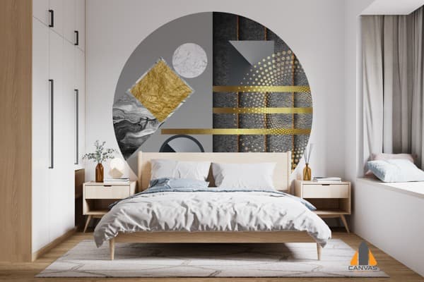 Modern bedroom with a circular geometric wall mural in gray and gold above the bed.