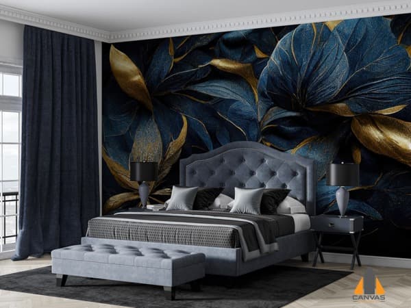 Navy and gold floral wall mural in a luxurious bedroom with a tufted headboard, perfect for wallpaper installations.
