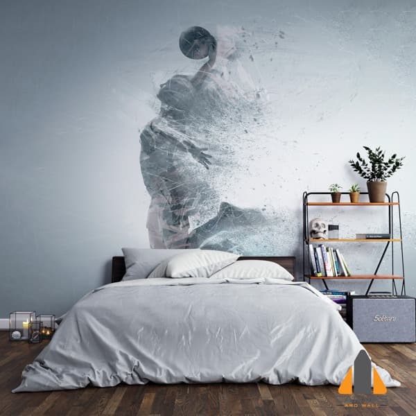 Dramatic basketball player disintegrating wall mural in a modern bedroom with light grey bedding.