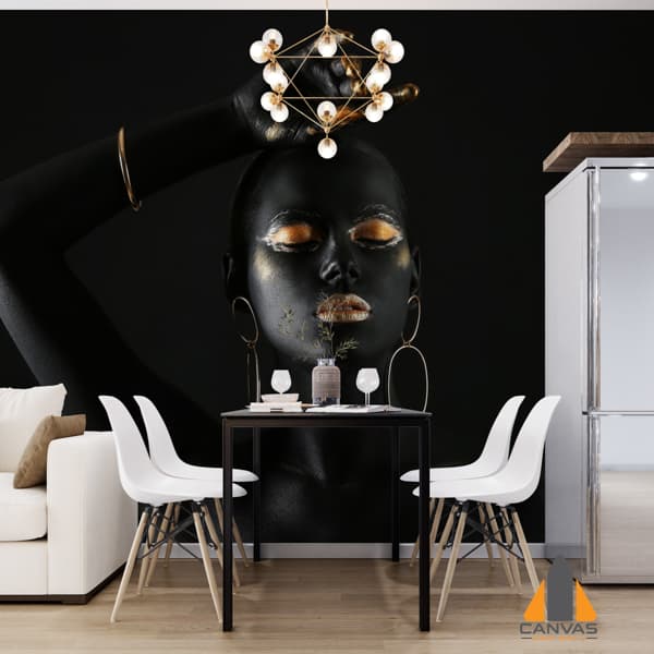 Black woman with gold lips and finger tips