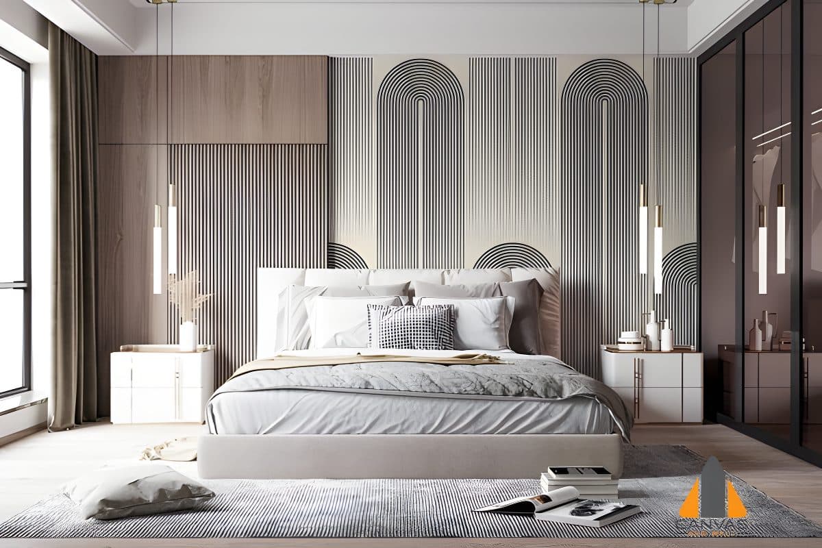 Bedroom with a cream and black geometric custom wallpaper installation behind the bed.