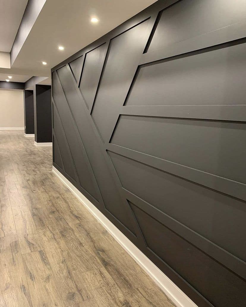 Modern geometric accent wall design in an entryway, great for custom wallpaper.