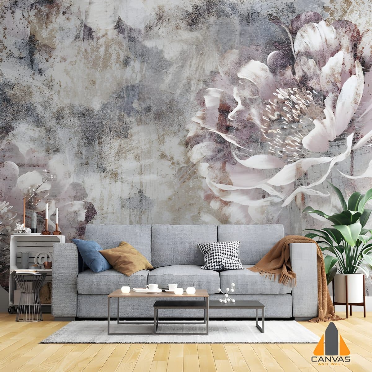 Floral abstract wall mural in a modern living room with a grey couch and coffee table.