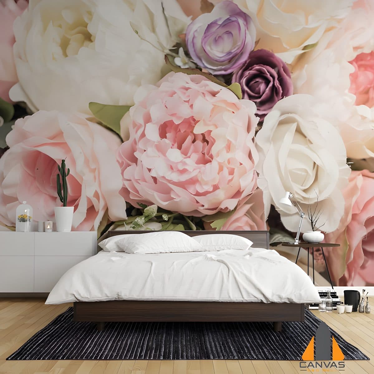 Pink, white, and purple floral wall mural in a modern bedroom with a white bed and dresser.