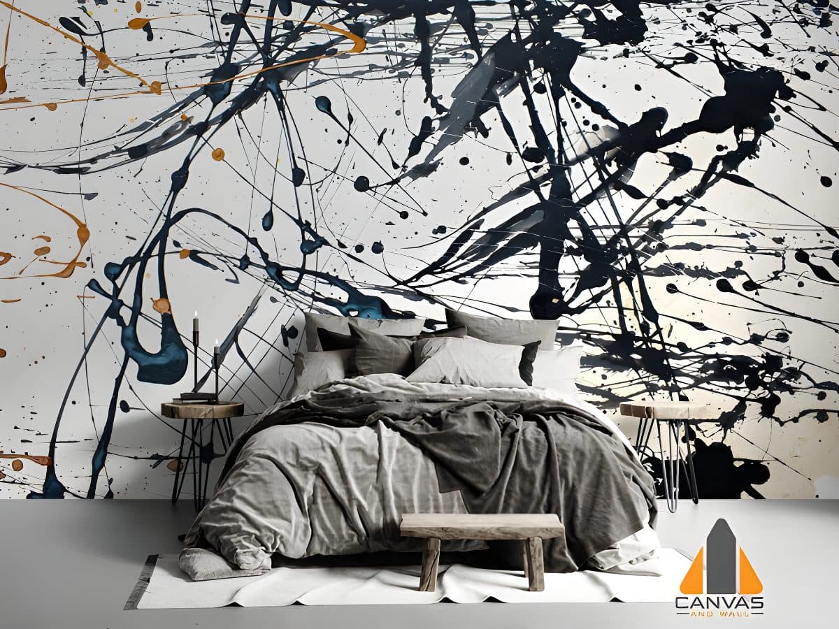 Splattered paint wall mural in a modern bedroom with a comfortable bed, an example of our custom wallpaper installations.