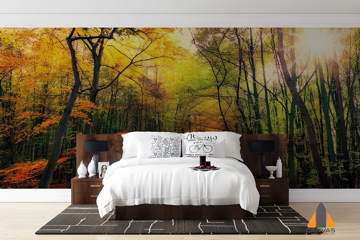 Autumn forest wall mural in a bedroom, with sunbeams through yellow and orange leaves. Wallpaper installations in Gauteng.