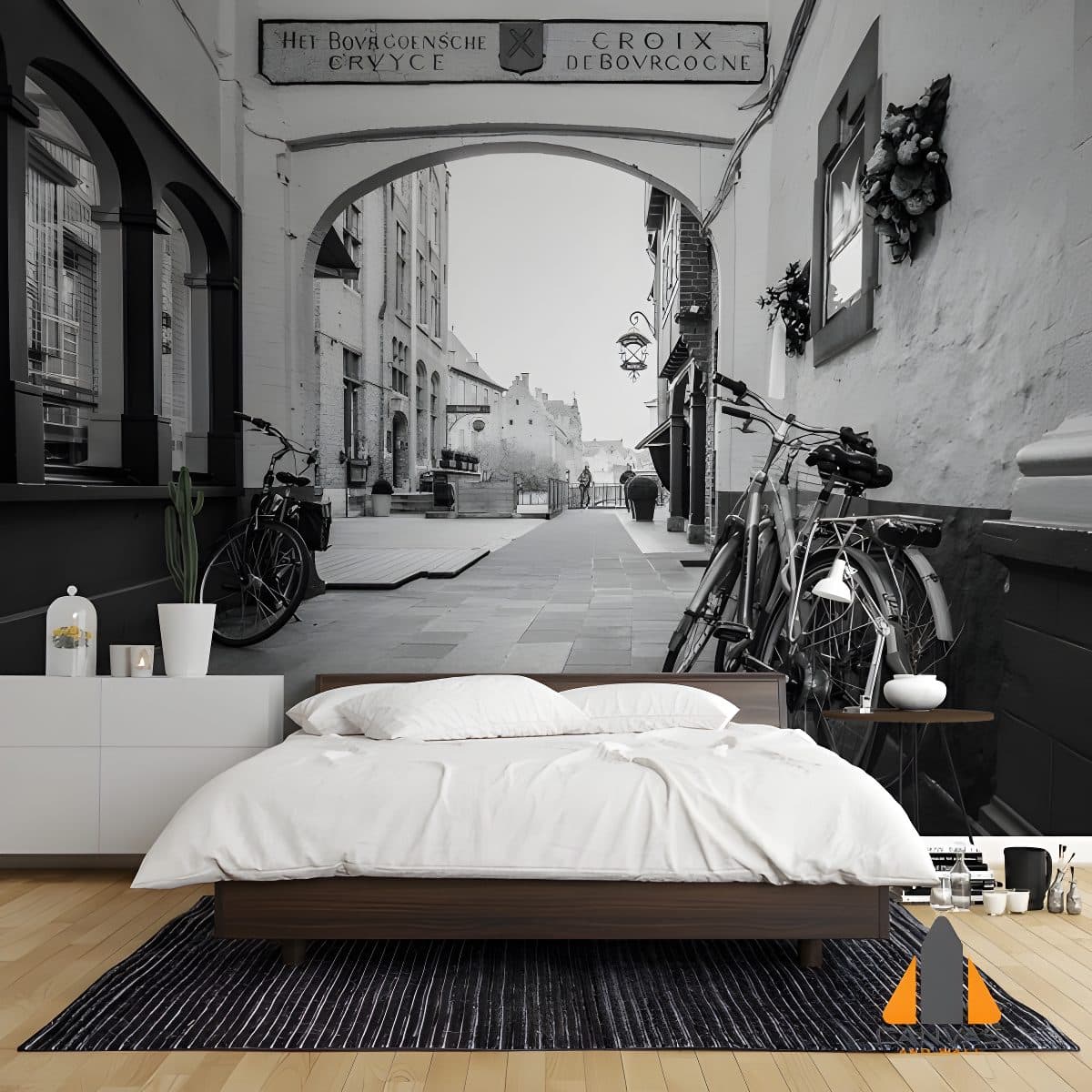 Black and white European street mural with bicycles in a minimalist bedroom. Wallpaper installations in Gauteng.