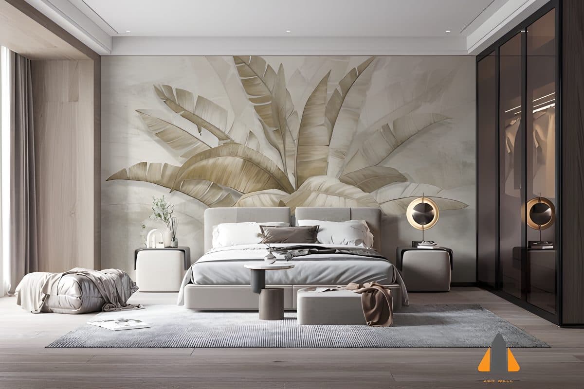Bedroom featuring a large tropical leaf wall mural above the bed, with light wood and grey furnishings.