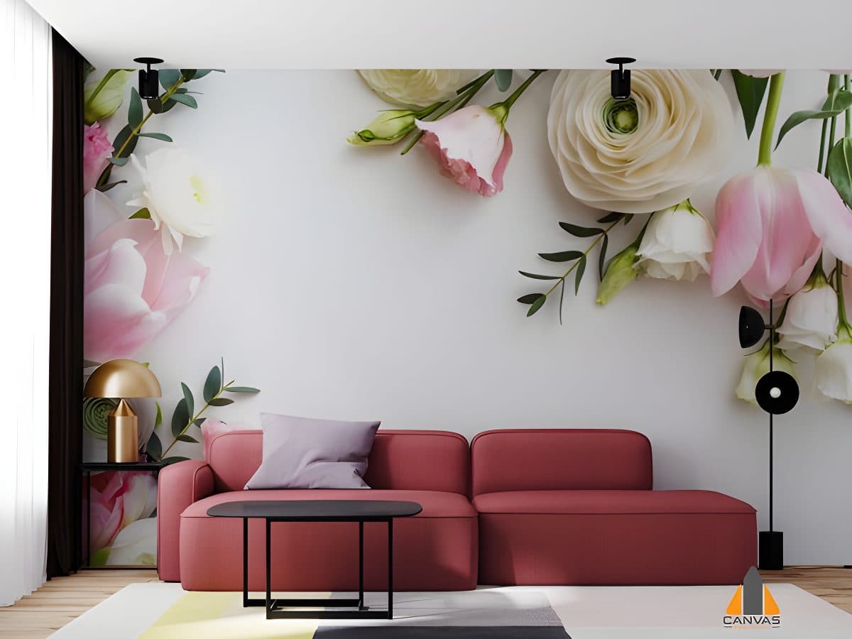 Pink and white floral wall mural in a modern living room with a red sofa, a beautiful wallpaper installation.