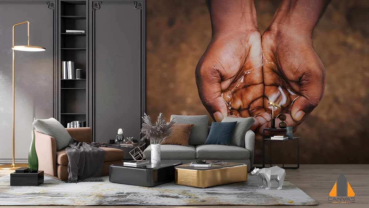 Cupped hands holding water feature as a wall mural in a modern living room with chic furniture.
