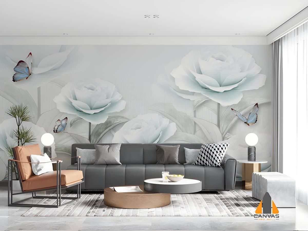 A beautiful floral wall mural in a modern living room with a grey sofa and brown armchair.