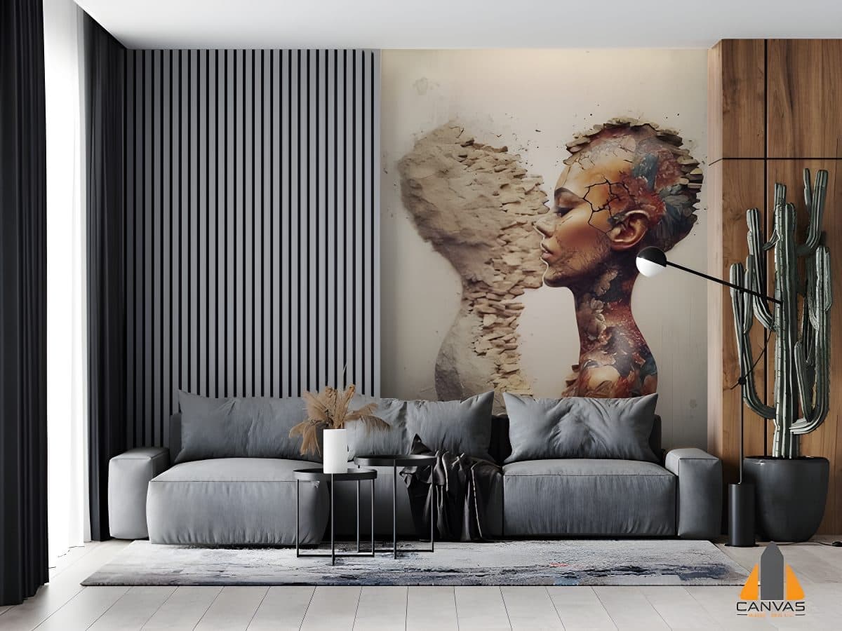 Dramatic wall mural of a tattooed woman's face and sand sculpture in a modern living room.