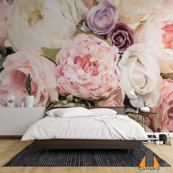 Pink, white, and purple floral wall mural in a modern bedroom with a white bed and dresser.