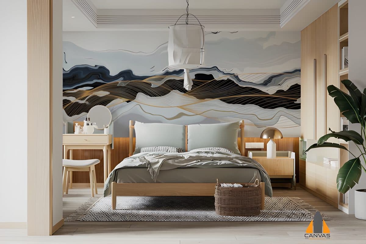 Abstract mountain landscape wall mural in a bedroom with natural wood furnishings and bedding.