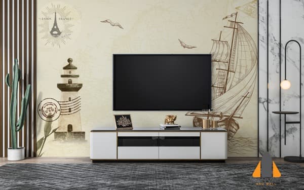 Nautical-themed wall mural with a sailboat and lighthouse in a modern living room setting.