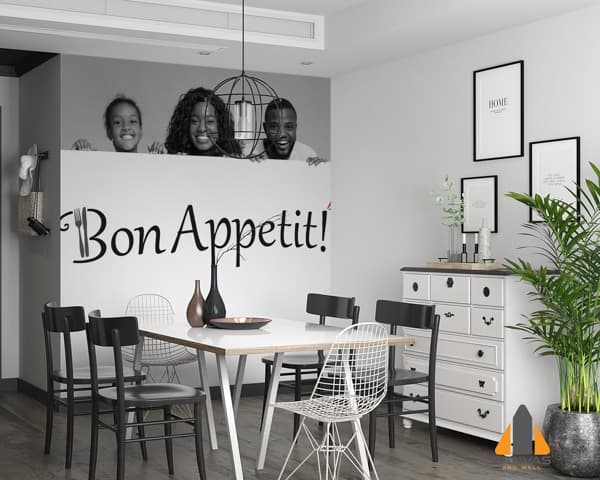 Family above a "Bon Appetit!" wall mural in a modern dining room setting.