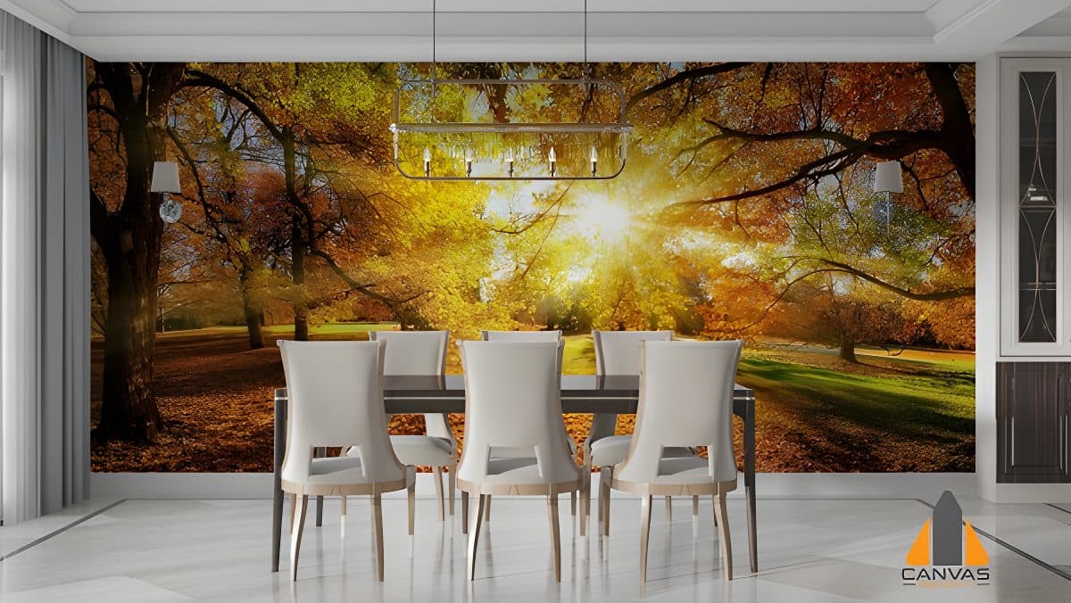 Autumn forest wall mural with sun rays filtering through trees in a modern dining room setting.