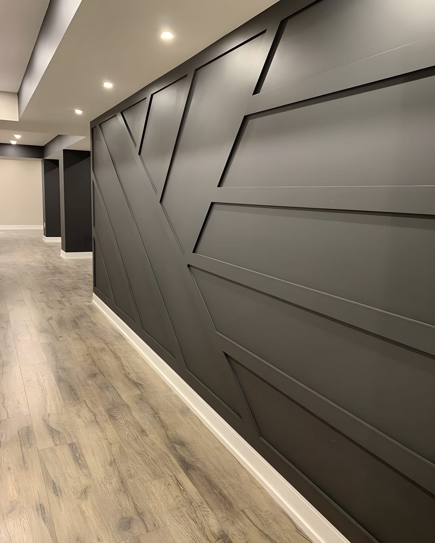 Modern geometric accent wall design in an entryway, great for custom wallpaper.