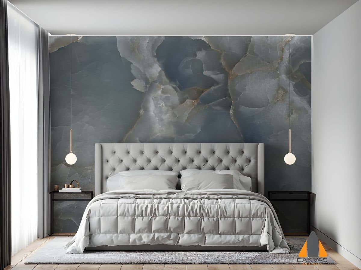 Blue translucent stone wall mural in a modern bedroom with a grey bed.