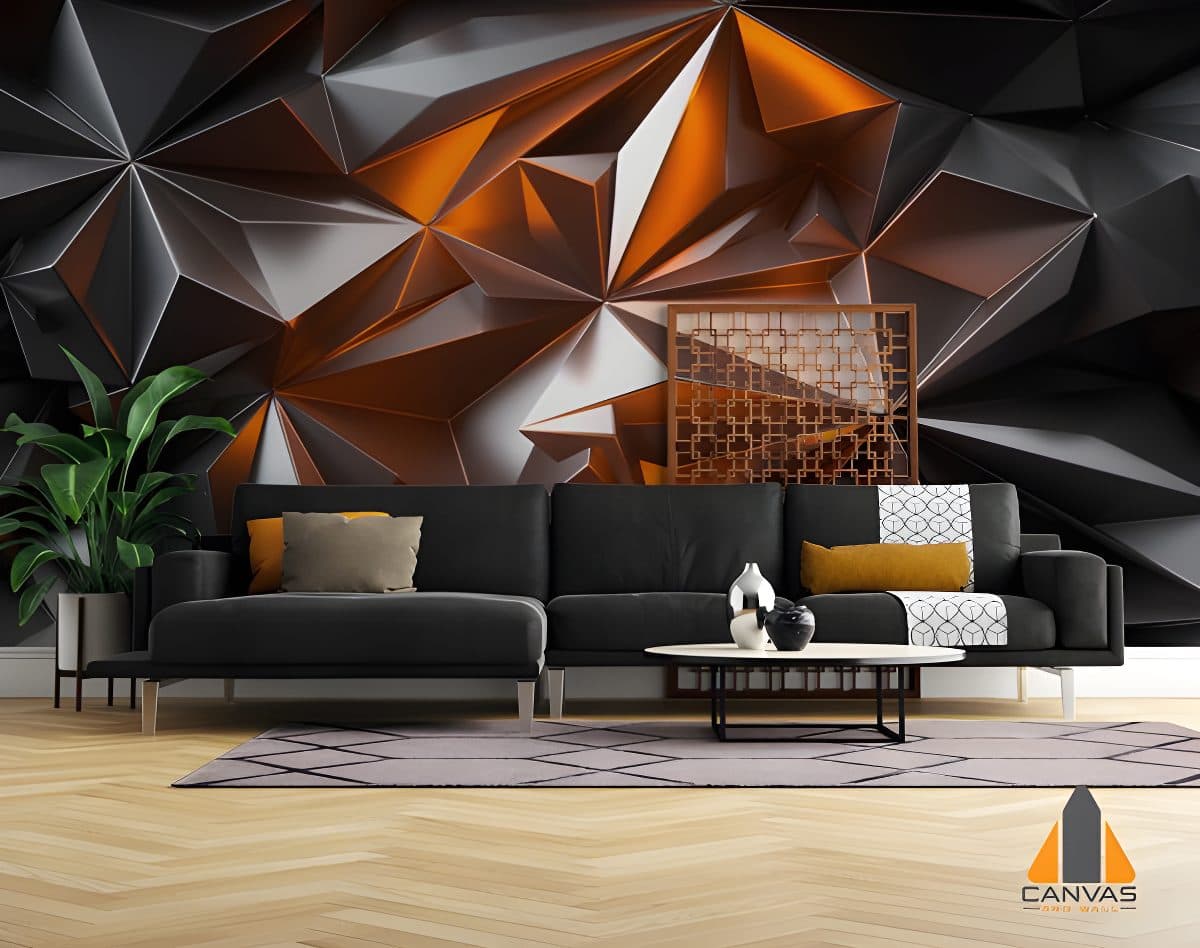 Modern living room with a 3D geometric wall mural in black and orange, black sofa, and wood floor.