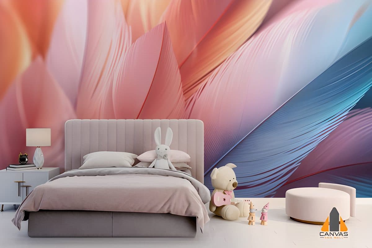 Soft feathers wallpaper in pastel pinks and blues installed in a child's bedroom with a pink bed.