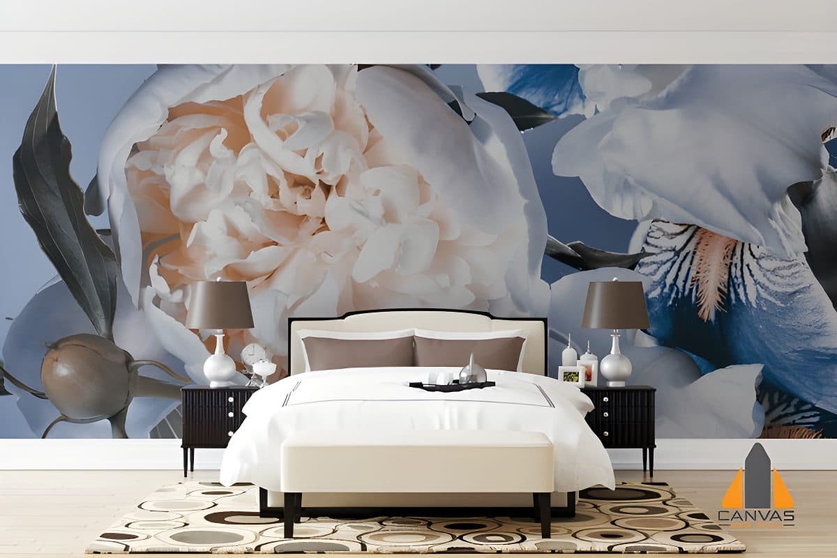 Large floral wall mural featuring white tulips and irises in a bedroom with a cream bed.