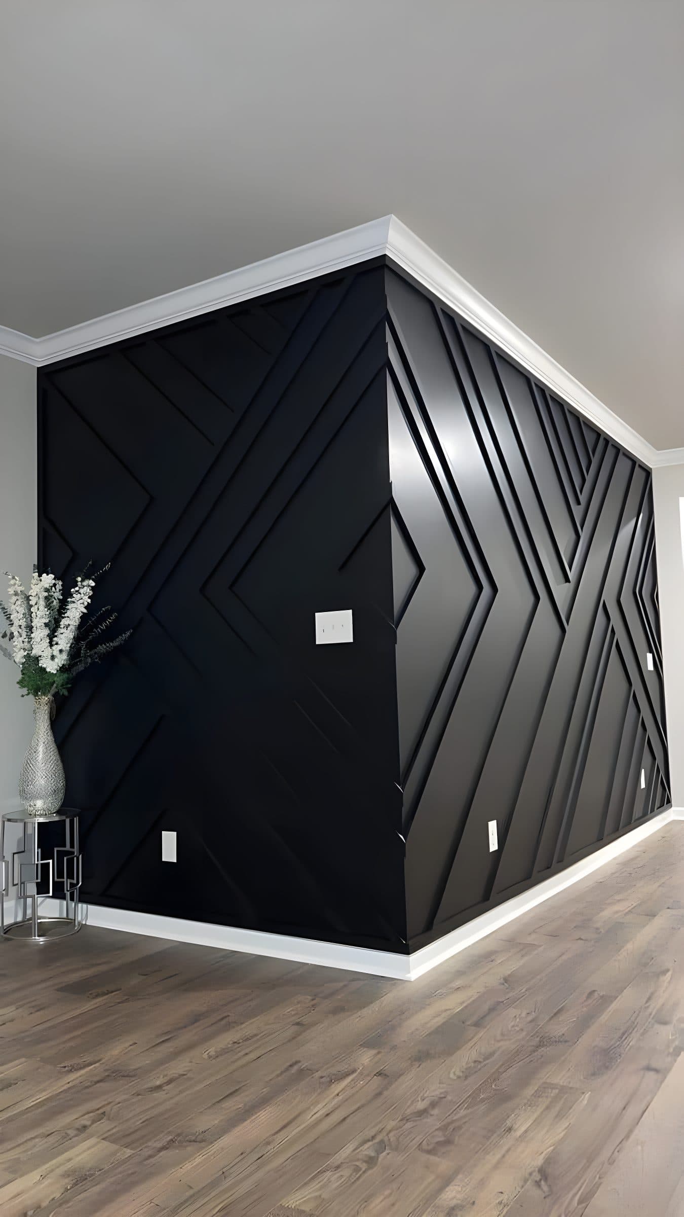Bold geometric accent wall with black paneling, perfect for wallpaper installations in Gauteng.