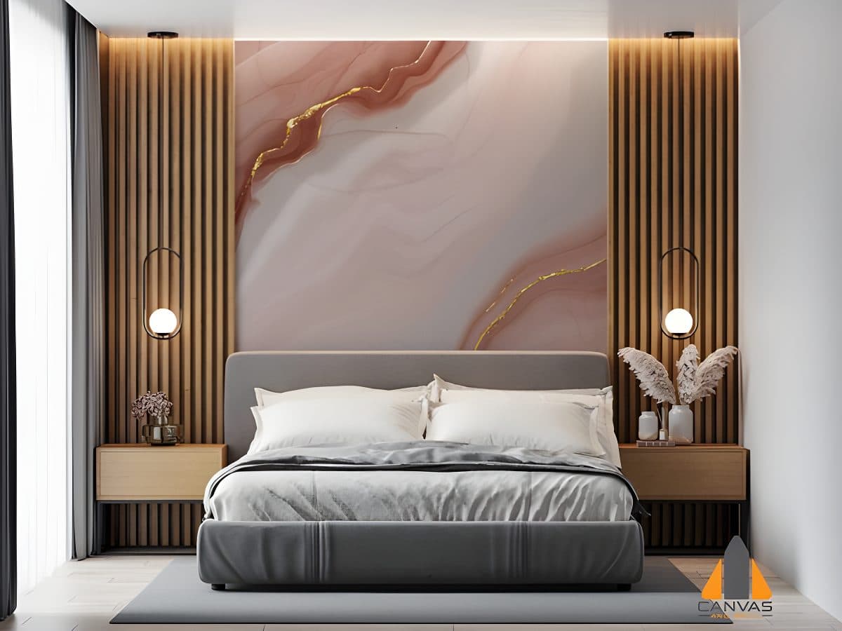 Pink and gold marble wall mural installation in a modern bedroom, with wooden slats.