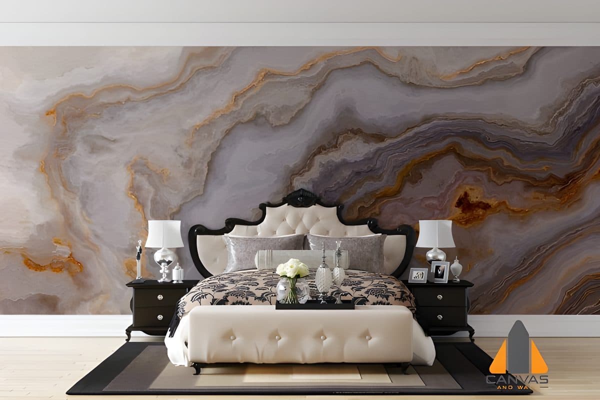 Dramatic marbled custom wallpaper installation in an elegant bedroom with a black and cream bed.