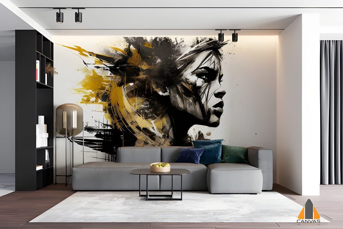 Dramatic portrait wall mural with gold and black paint splashes in a modern living room setting.