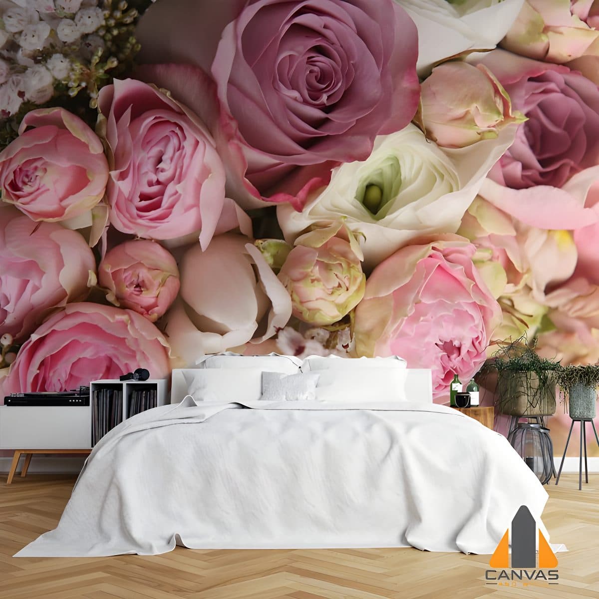 Close-up of pink and purple roses and flowers as a wall mural in a modern bedroom, with wallpaper installations.