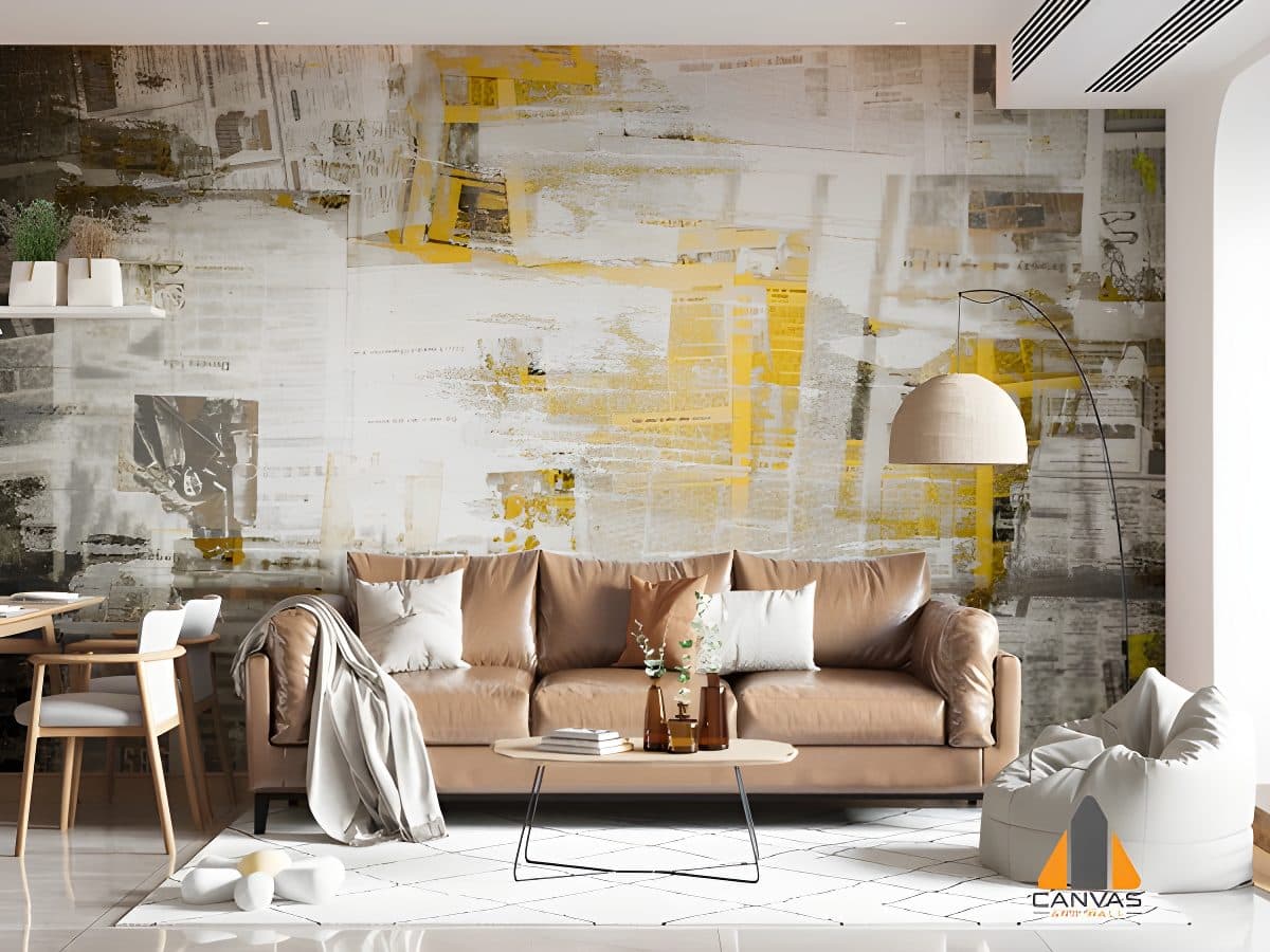 Abstract newspaper wall mural in a modern living room with a brown leather couch.