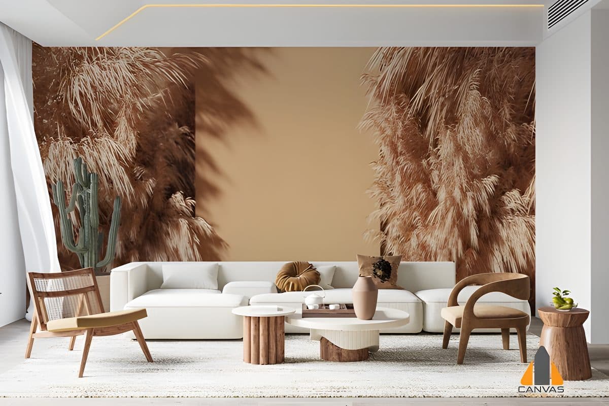 Pampas grass wallpaper mural in a modern living room with a white sofa and wooden furniture.
