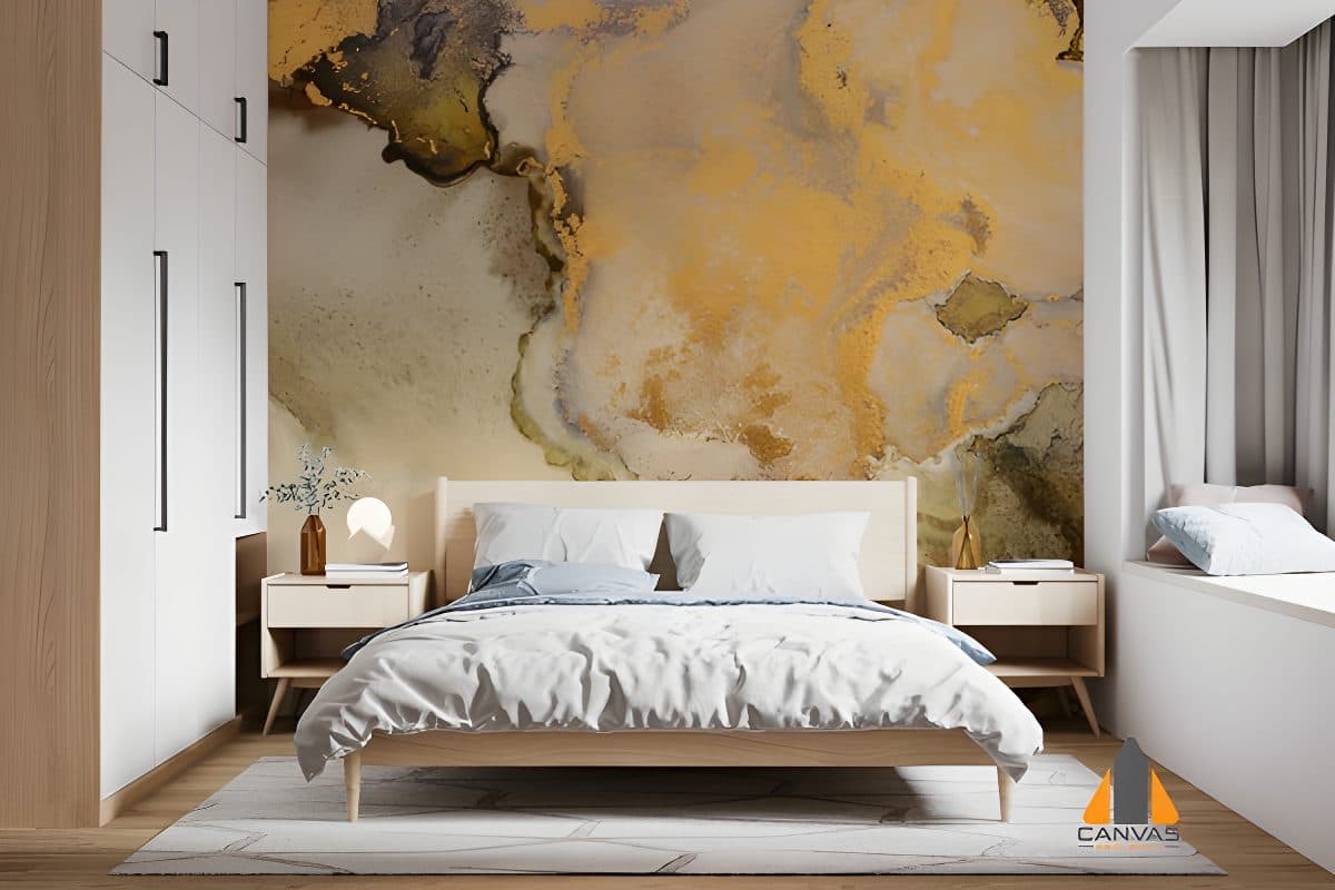 Gold and grey abstract fluid art wall mural in a modern bedroom, available for wallpaper installations in Gauteng.