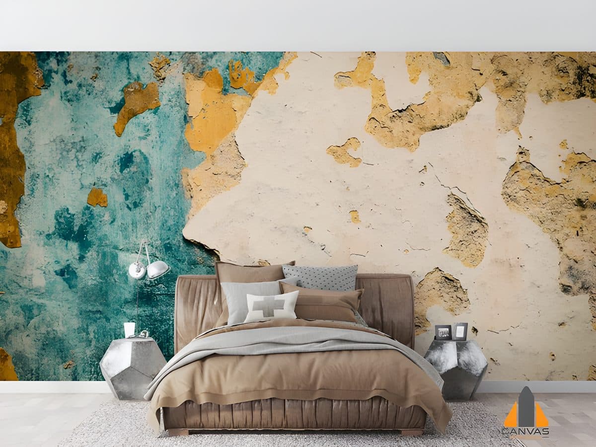 Distressed teal and beige wall mural in a modern bedroom with a brown bed and metallic side tables.
