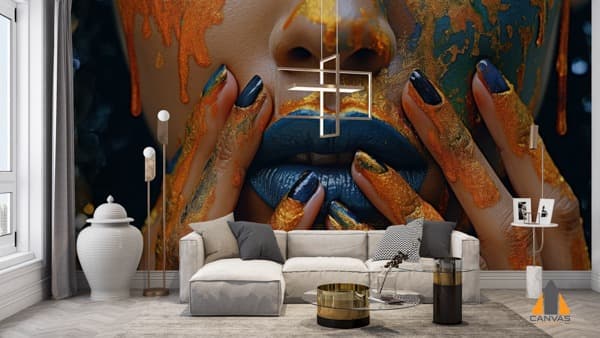 Close-up of a woman's face with gold and blue paint, featured as a modern wall mural in a living room.