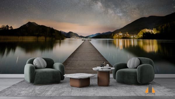 Wooden pier stretching across a lake under the Milky Way, a stunning wall mural in a modern living room.