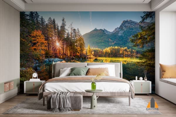 Sunrise over an autumn lake and forest wall mural in a modern bedroom, ideal for wallpaper installations.