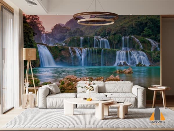 Waterfall wall mural in a modern living room, expertly installed by our team for wallpaper installations in Gauteng.