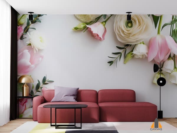 Pink and white floral wall mural in a modern living room with a red sofa, a beautiful wallpaper installation.