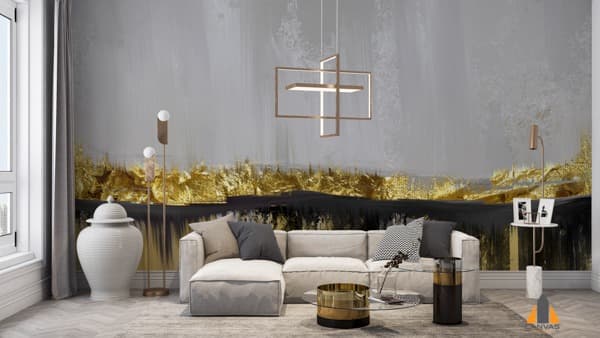 Abstract gold and grey wall mural in a modern living room featuring a white sofa and elegant pendant light.